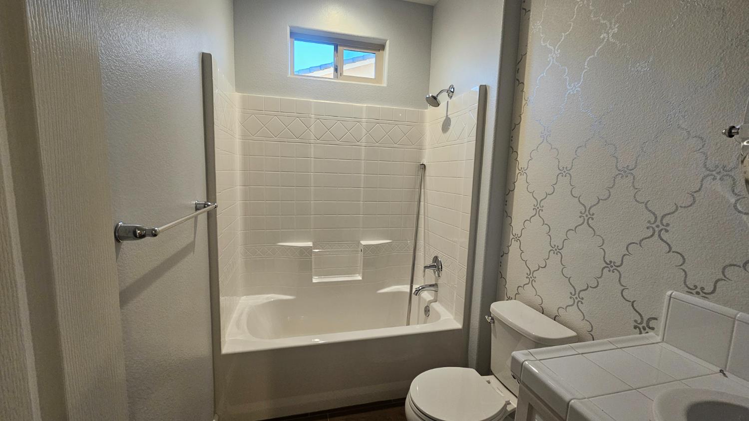 3351 Cordova Avenue Clovis, CA 93619 - Photo 5 of 33 a bathroom with a toilet and a shower