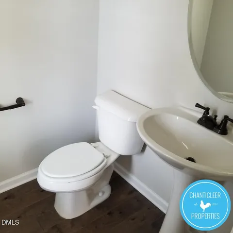 a bathroom with a toilet and a sink