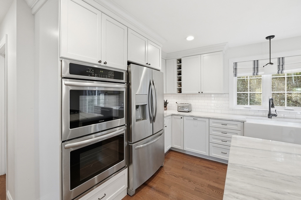 103 Rice Corner Road Brookfield, MA 01506 - Photo 6 of 39 a kitchen with granite countertop cabinets stainless steel appliances and window
