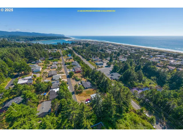 an aerial view of residential building and green space