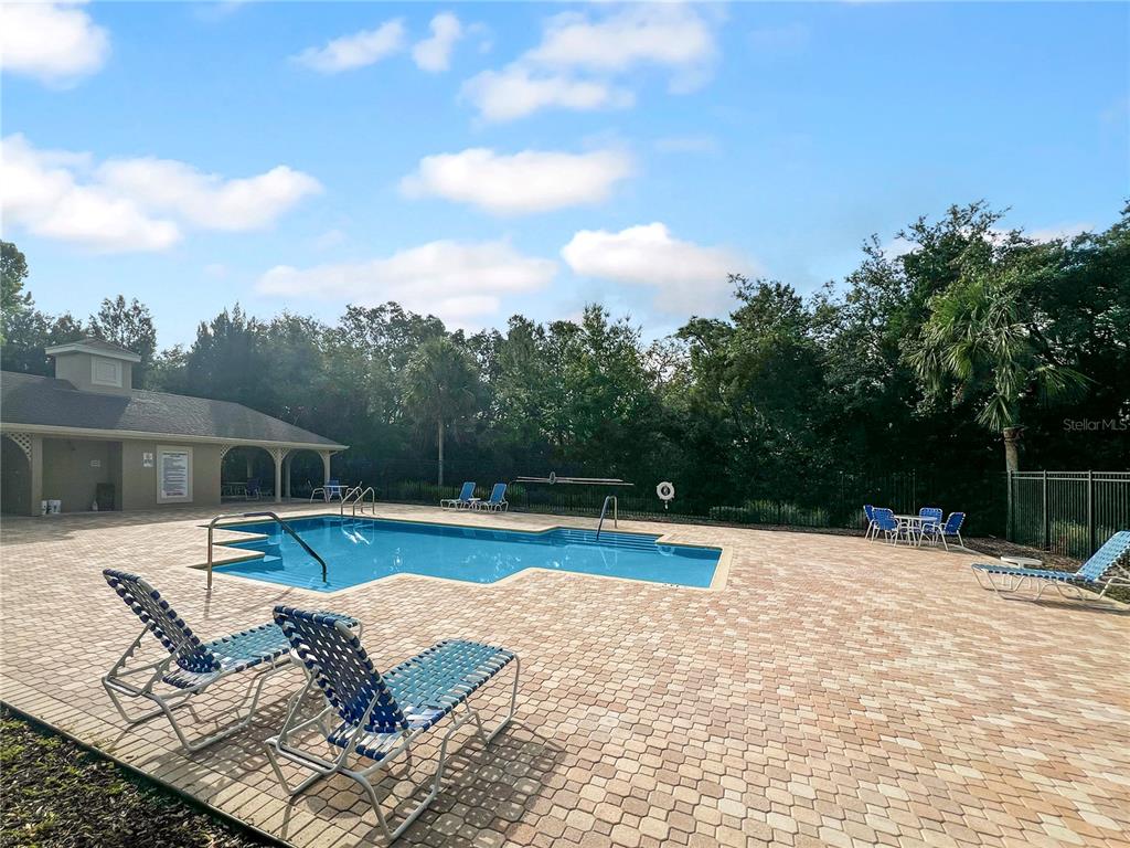 15767 Stable Run Drive Spring Hill, FL 34610 - Photo 31 of 34 a view of swimming pool with lounge chair