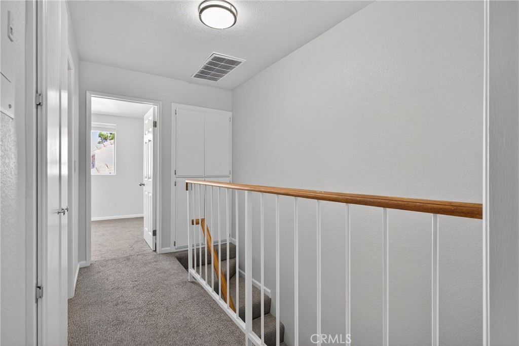 2720 Gramercy Avenue, Unit 5 Torrance, CA 90501 - Photo 22 of 35 a view of a hallway with wooden floor