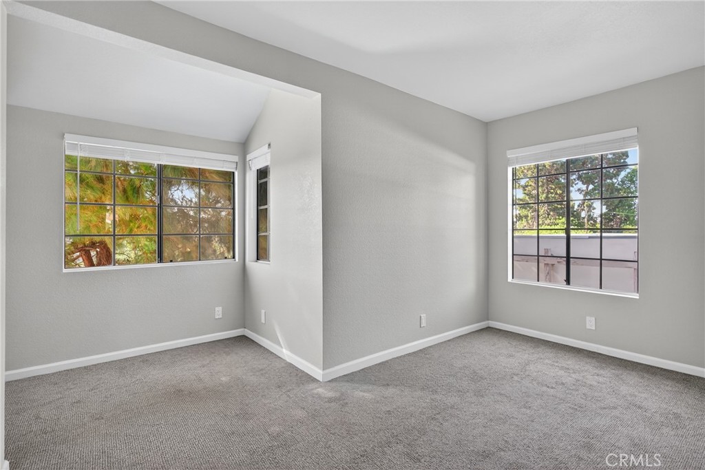 2720 Gramercy Avenue, Unit 5 Torrance, CA 90501 - Photo 26 of 35 an empty room with windows