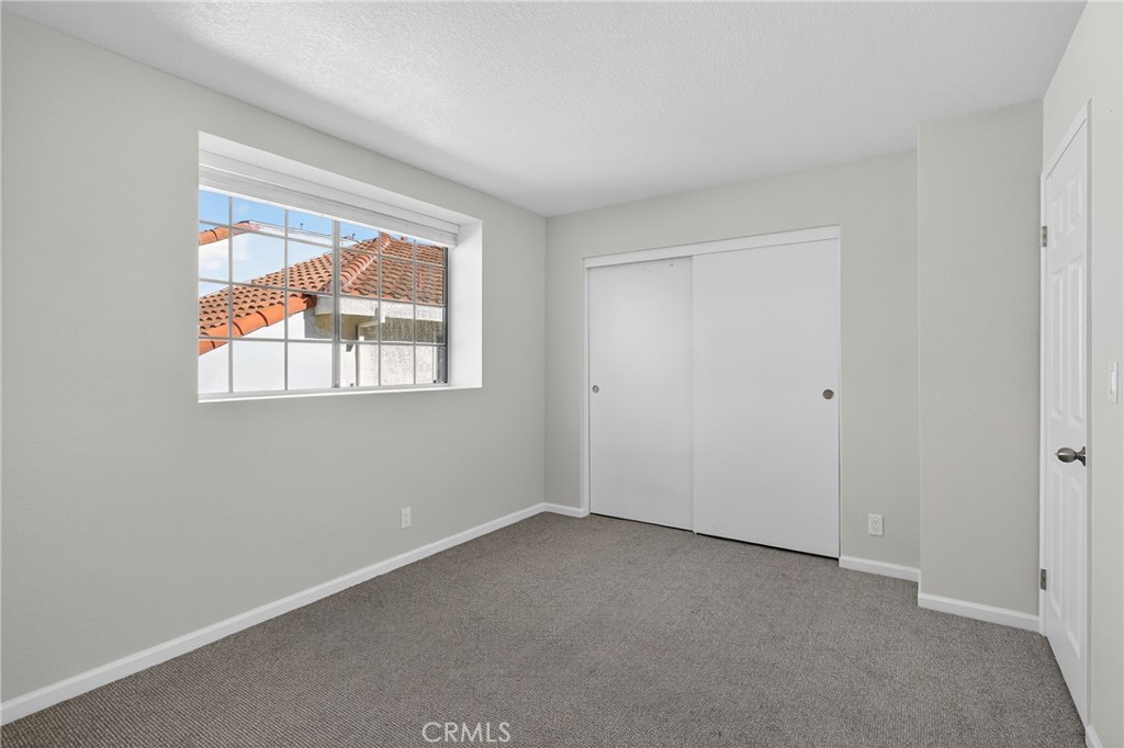 2720 Gramercy Avenue, Unit 5 Torrance, CA 90501 - Photo 28 of 35 an empty room with windows