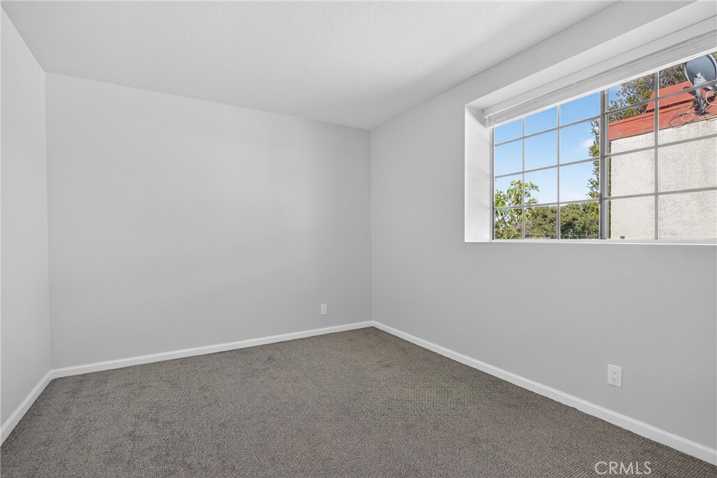 2720 Gramercy Avenue, Unit 5 Torrance, CA 90501 - Photo 30 of 35 an empty room with a window