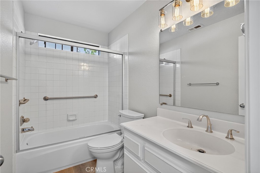 2720 Gramercy Avenue, Unit 5 Torrance, CA 90501 - Photo 31 of 35 a bathroom with a sink a toilet and shower