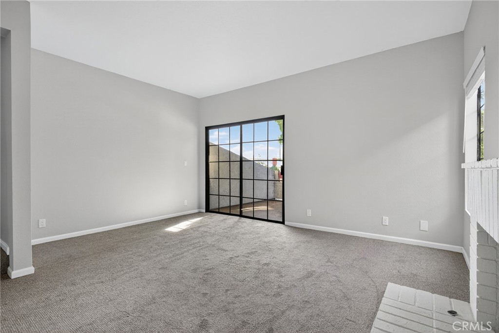 2720 Gramercy Avenue, Unit 5 Torrance, CA 90501 - Photo 10 of 35 a view of an empty room with a window