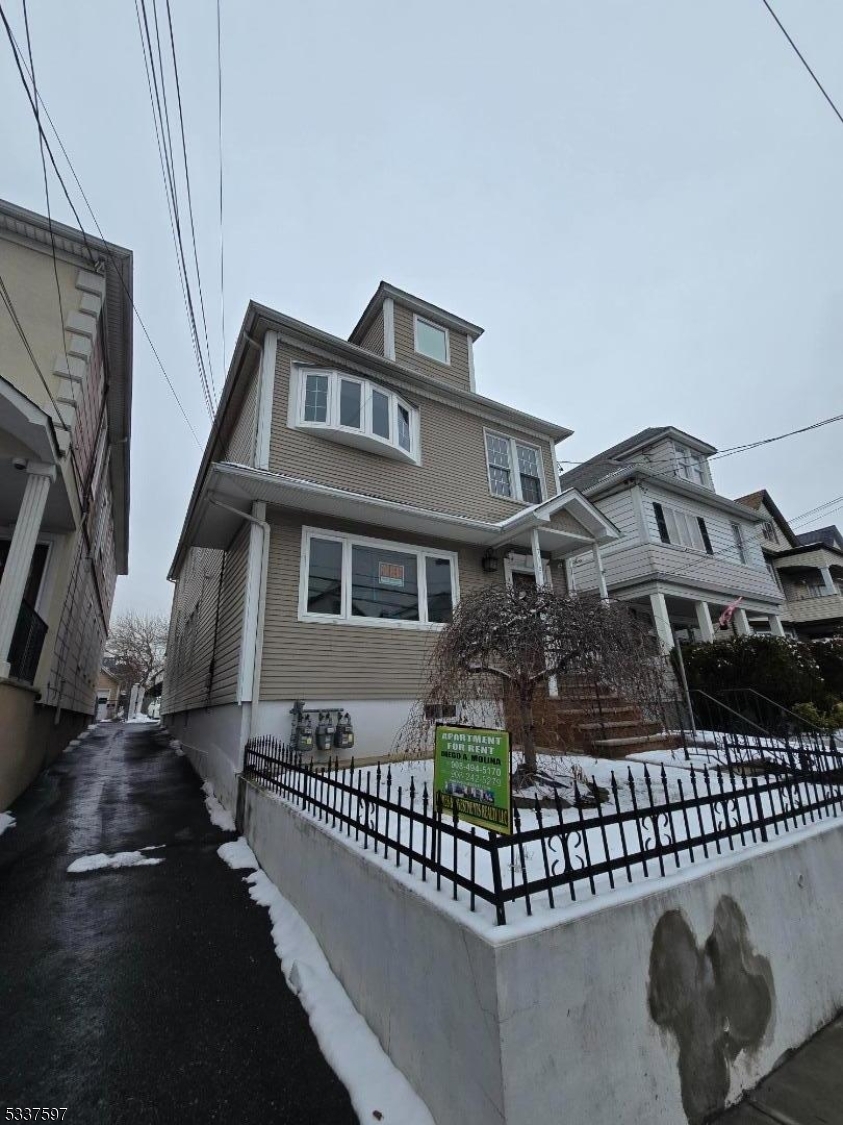 712 Jackson Avenue, Unit 2 Elizabeth, NJ 07201 - Photo 4 of 4 a front view of a house