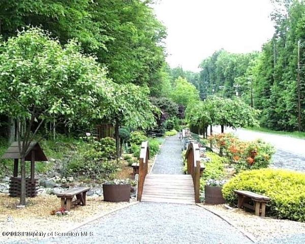 1284 Brookfield Road Lake Ariel, PA 18436 - Photo 33 of 36 a view of a garden with plants