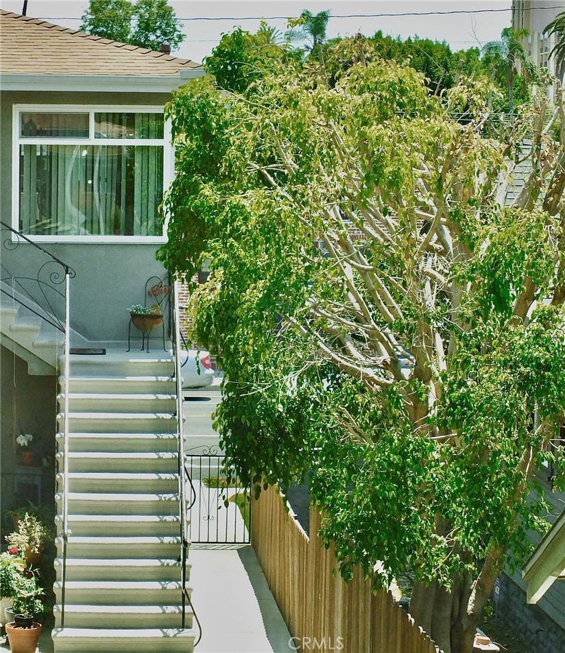 1808 East Appleton Street, Unit 7 Long Beach, CA 90802 - Photo 32 of 44 a view of a house with a yard
