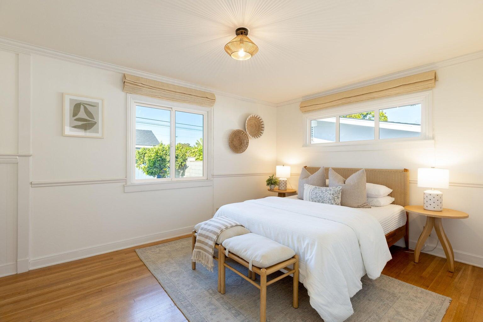 755 Calle Rey Mar Carpinteria, CA 93013 - Photo 12 of 18 a bedroom with a bed and a window