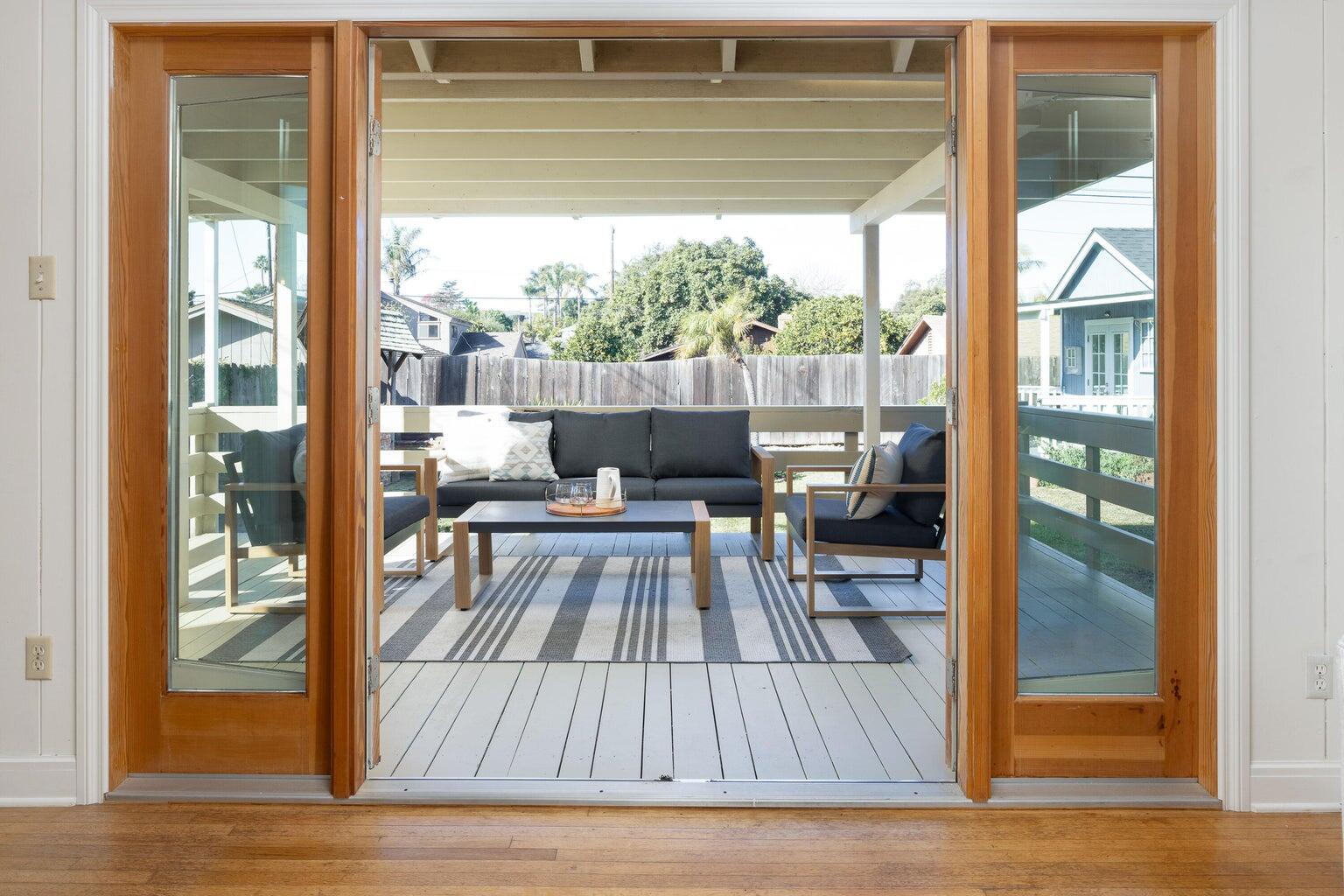 755 Calle Rey Mar Carpinteria, CA 93013 - Photo 13 of 18 a view of a living room and a floor to ceiling window
