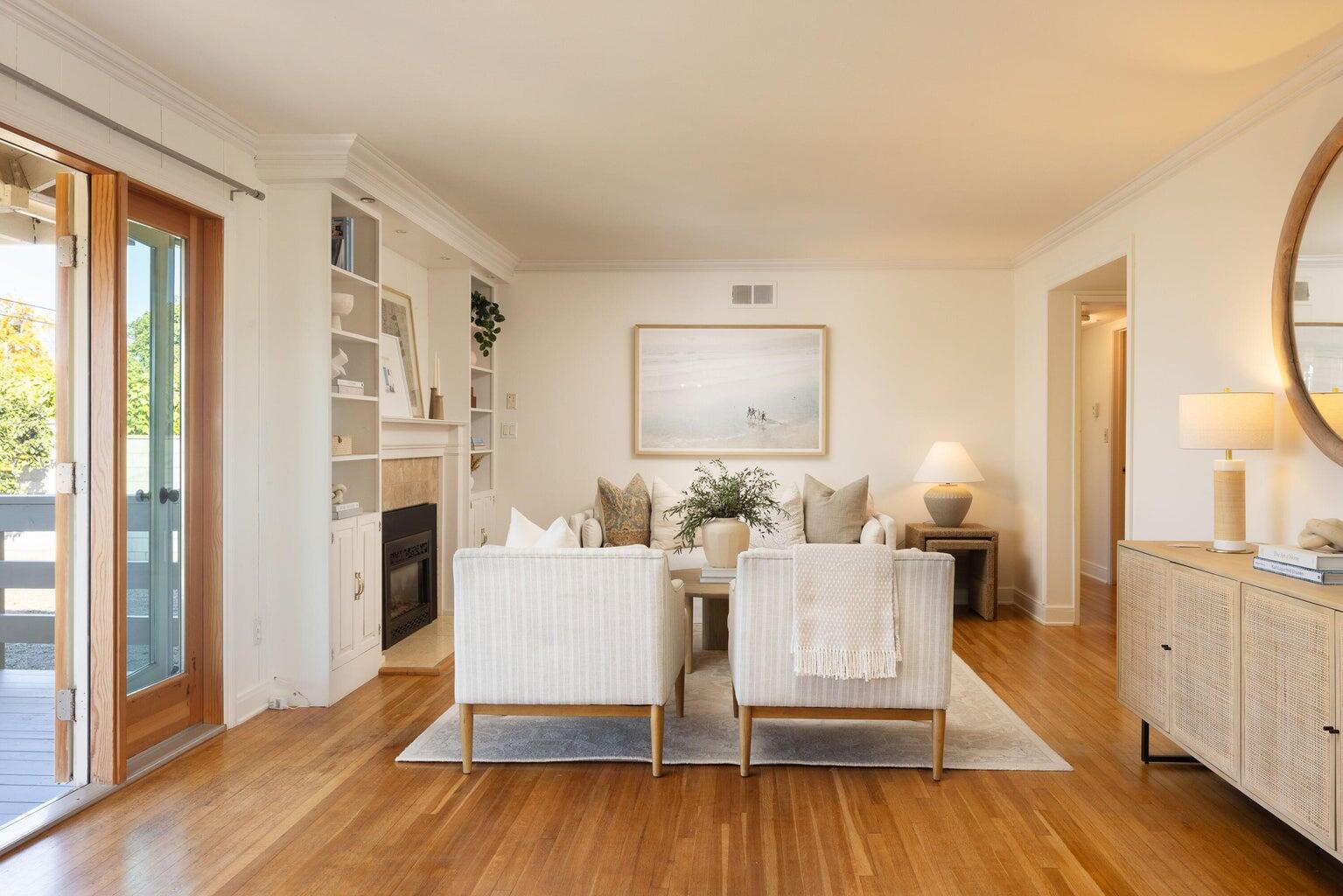 755 Calle Rey Mar Carpinteria, CA 93013 - Photo 4 of 18 a living room with furniture a fireplace and wooden floor
