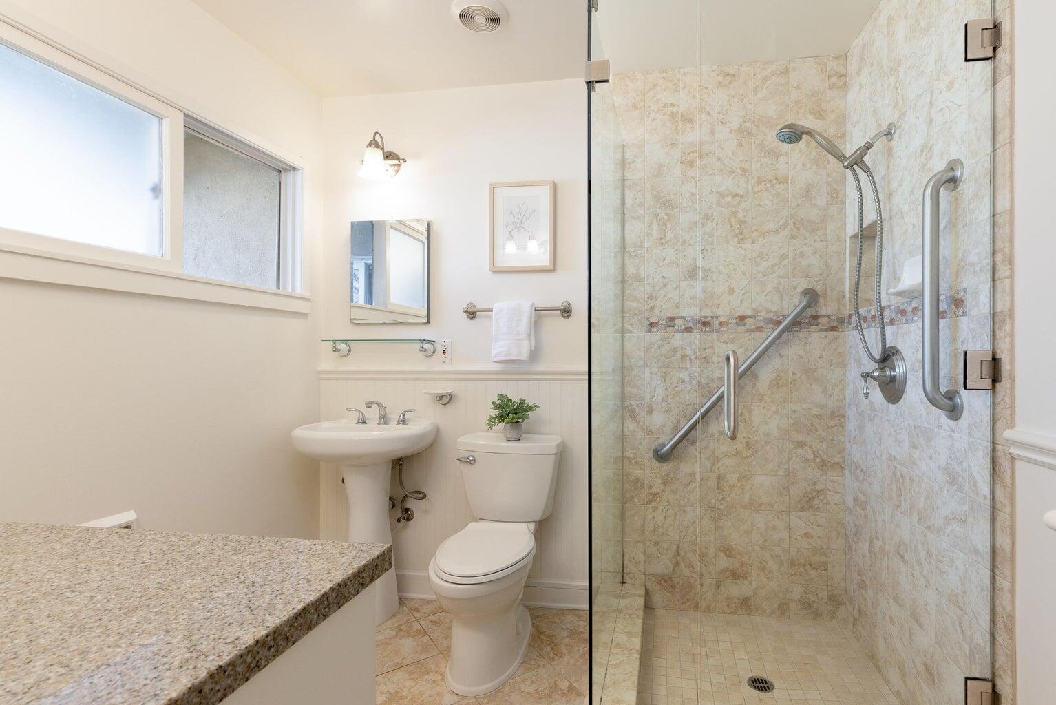 755 Calle Rey Mar Carpinteria, CA 93013 - Photo 9 of 18 a bathroom with a sink a toilet and shower