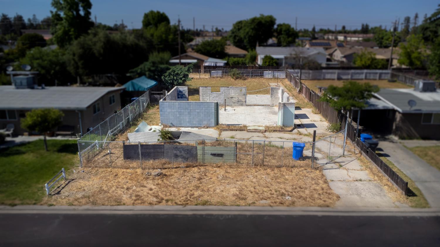 an aerial view of a house with lake view