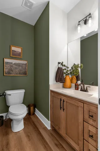 a kitchen with a sink cabinets and appliances