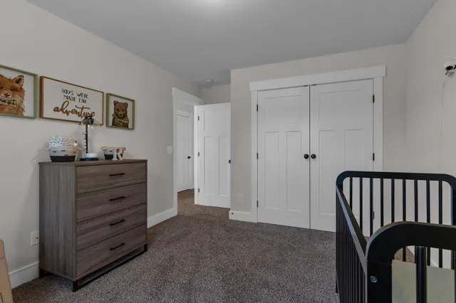 a bathroom with a sink a toilet and shower curtain