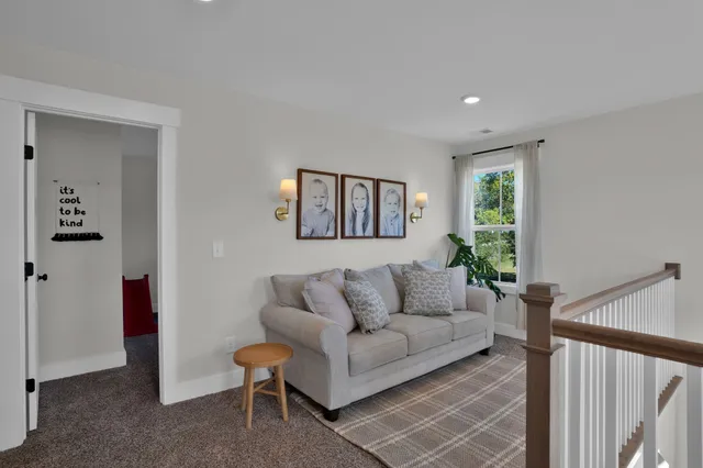 a bed room with a bed and a television