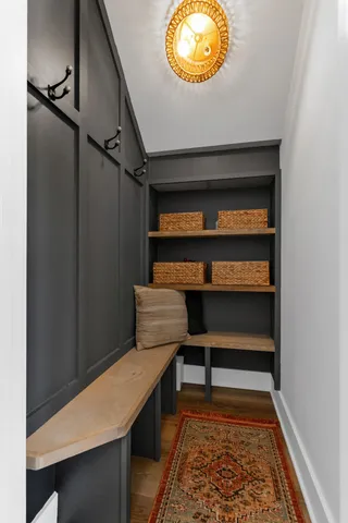 a workspace with furniture and book shelf