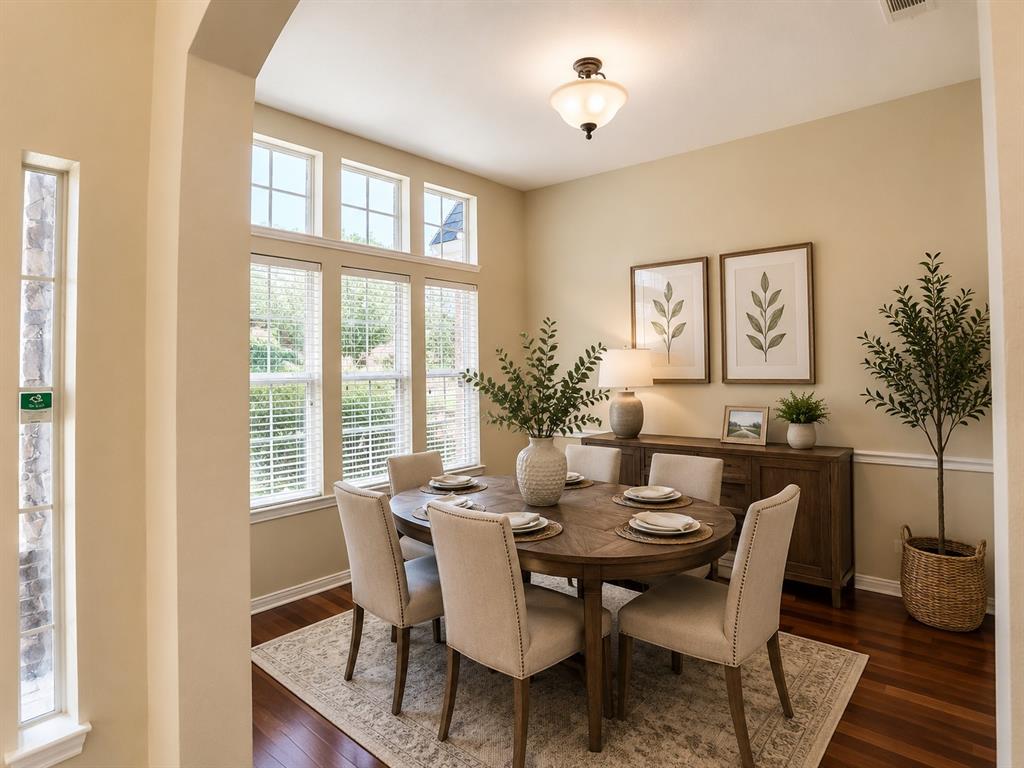 5708 Rickshaw Lane Plano, TX 75094 - Photo 6 of 28 Formal dining area featuring rich wood-finish flooring