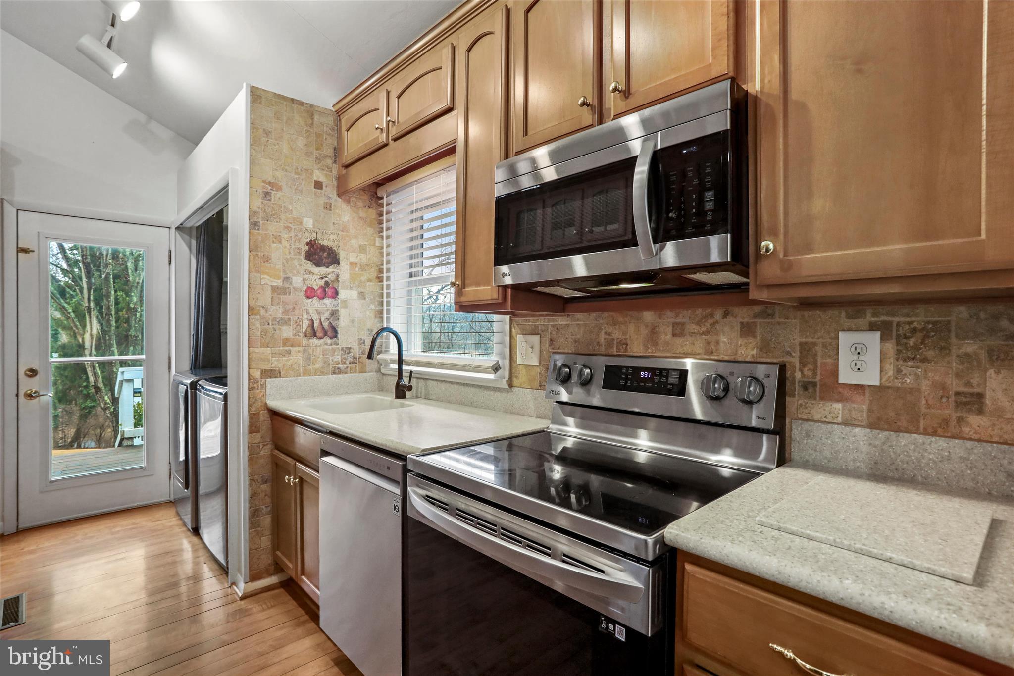 565 South River Road Front Royal, VA 22630 - Photo 13 of 68 a kitchen with stainless steel appliances and granite countertop a sink