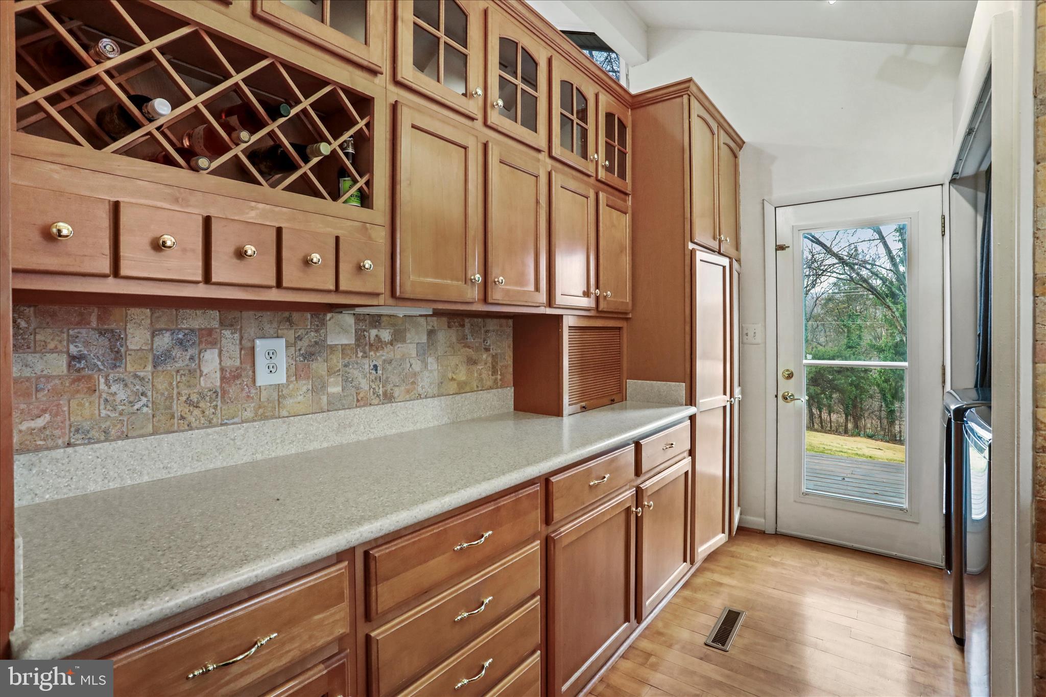 565 South River Road Front Royal, VA 22630 - Photo 14 of 68 a kitchen with stainless steel appliances granite countertop a sink a stove and a microwave oven