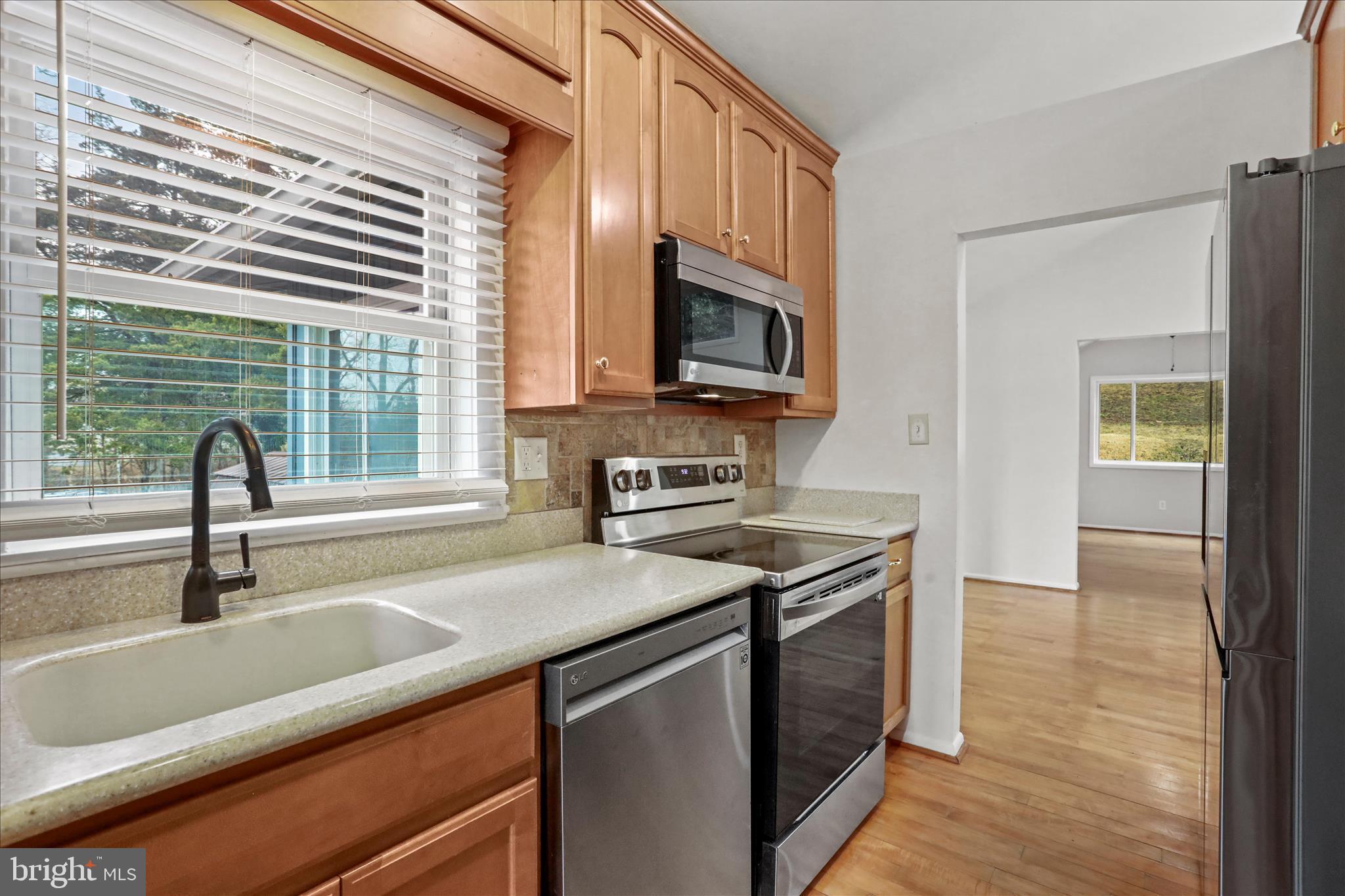 565 South River Road Front Royal, VA 22630 - Photo 15 of 68 a kitchen that has a sink and a stove