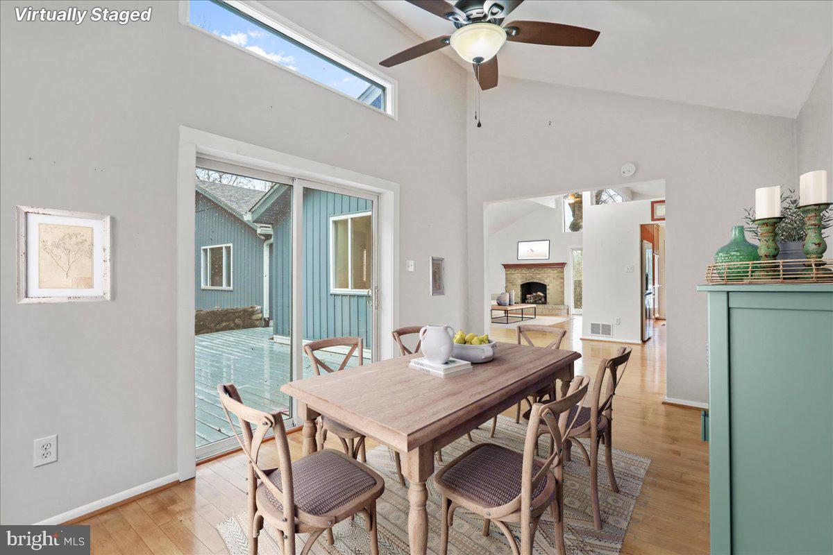 565 South River Road Front Royal, VA 22630 - Photo 17 of 68 a view of a dining room with furniture and a chandelier