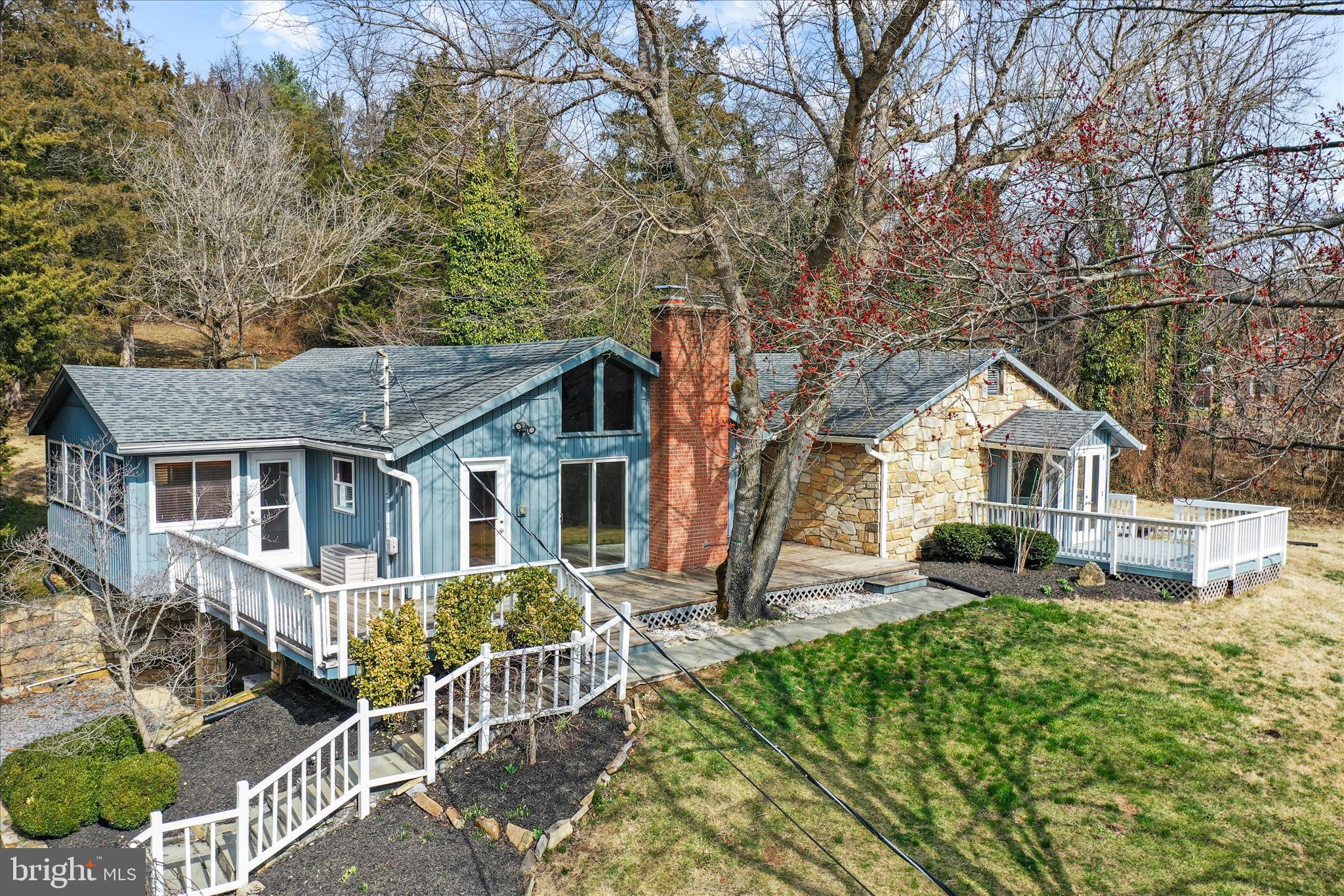 565 South River Road Front Royal, VA 22630 - Photo 2 of 68 a front view of a house with a yard