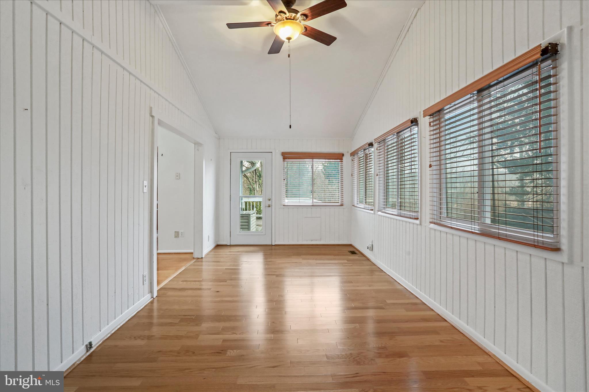 565 South River Road Front Royal, VA 22630 - Photo 22 of 68 a view of an empty room with a window and wooden floor