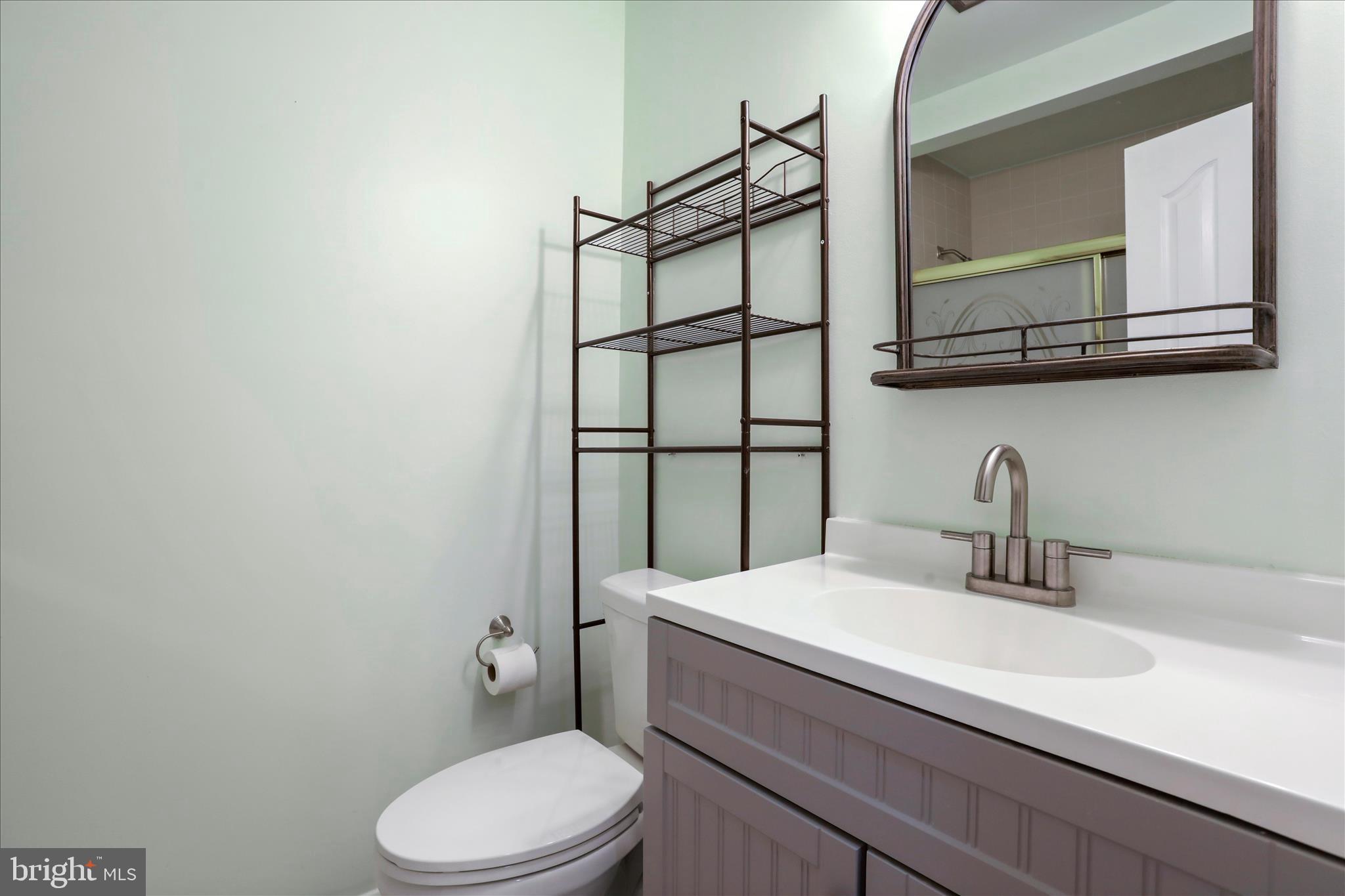 565 South River Road Front Royal, VA 22630 - Photo 25 of 68 a bathroom with a sink a toilet and mirror