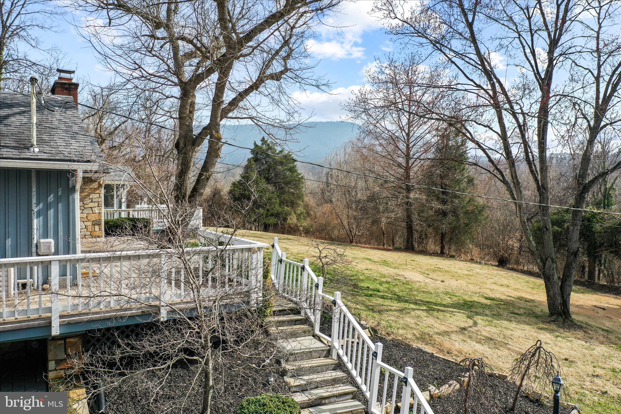 565 South River Road Front Royal, VA 22630 - Photo 3 of 68 a view of a patio with two chairs next to a yard