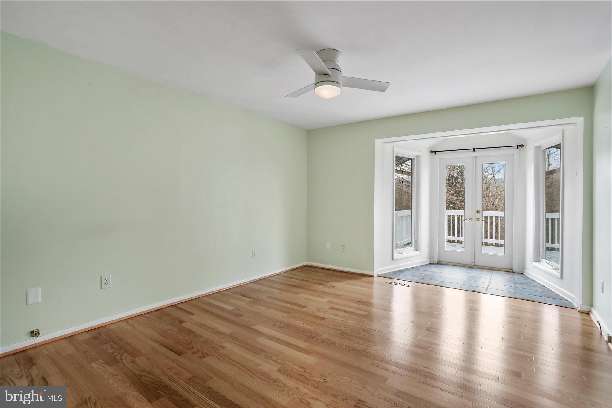 565 South River Road Front Royal, VA 22630 - Photo 31 of 68 a view of an empty room with wooden floor and a window