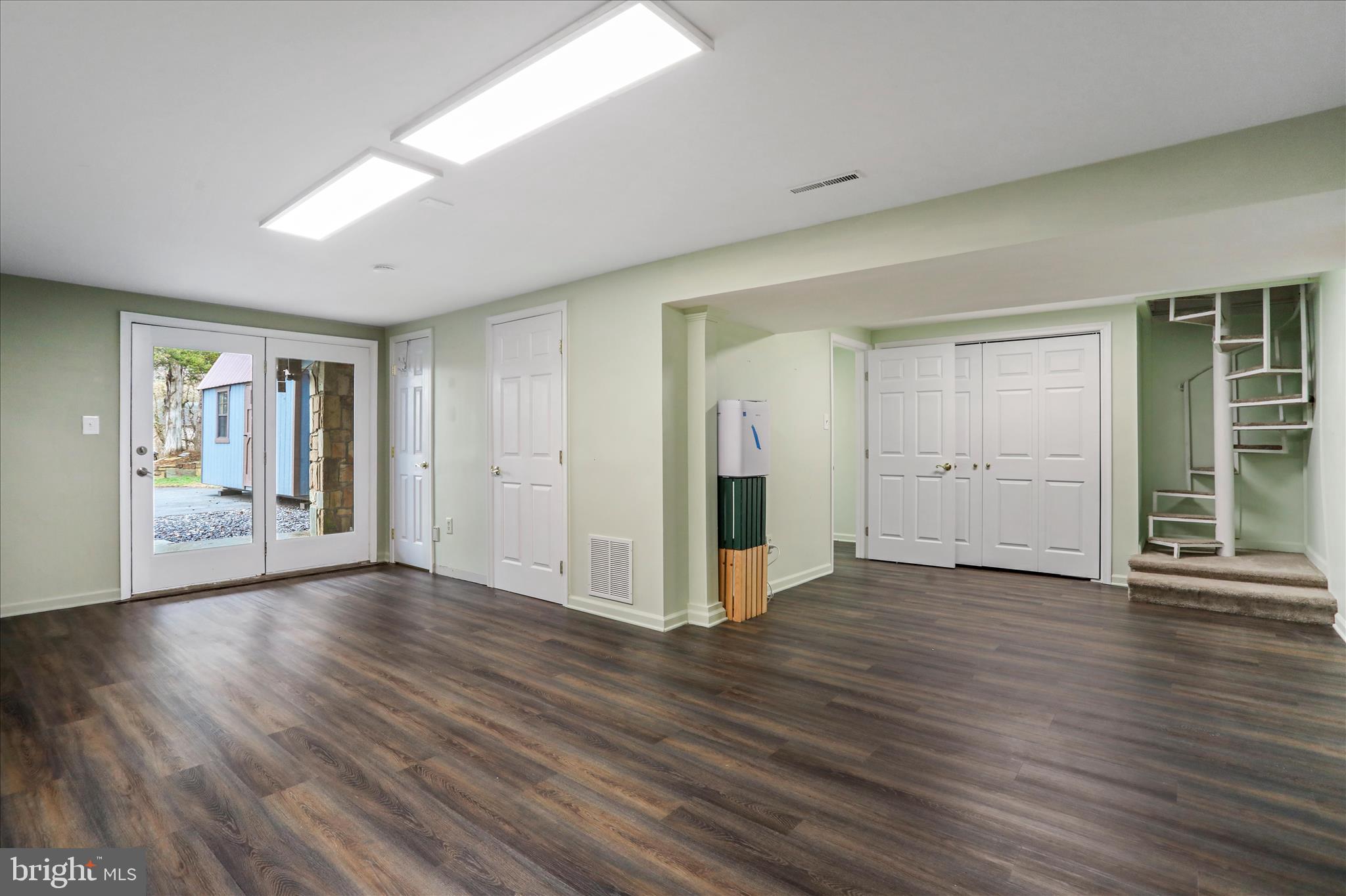 565 South River Road Front Royal, VA 22630 - Photo 39 of 68 a view of an empty room with wooden floor and a window