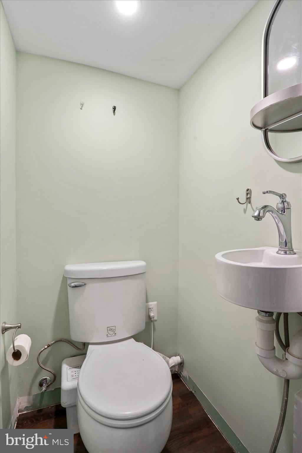 565 South River Road Front Royal, VA 22630 - Photo 43 of 68 a white toilet sitting next to a bathroom sink