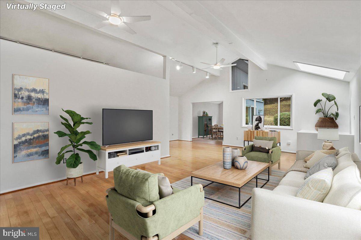 565 South River Road Front Royal, VA 22630 - Photo 8 of 68 a living room with furniture and a flat screen tv