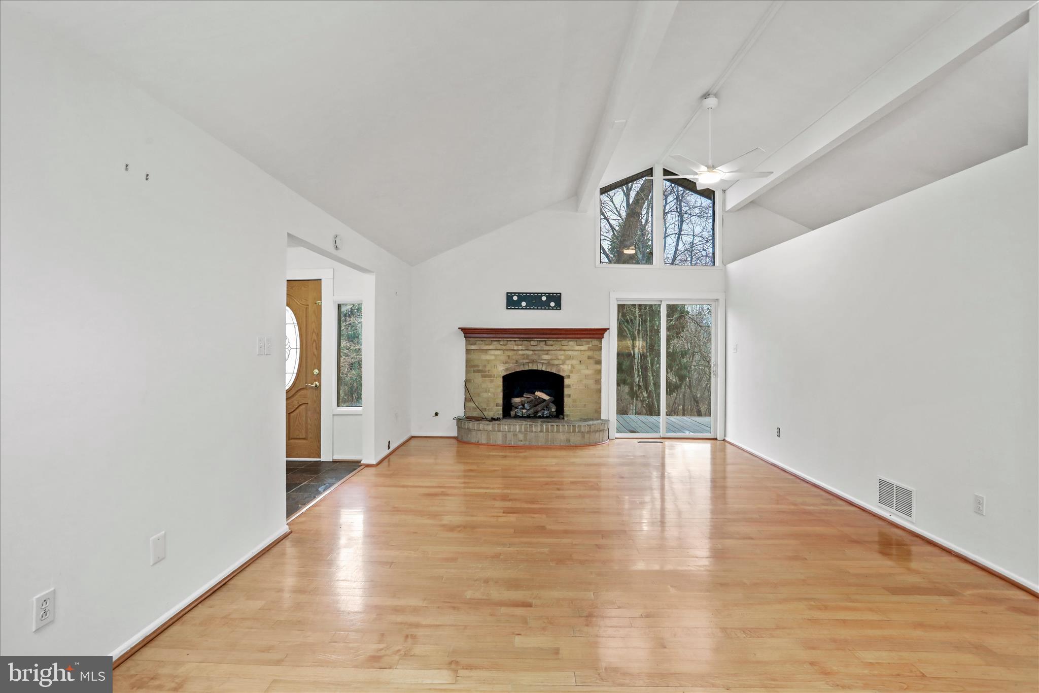 565 South River Road Front Royal, VA 22630 - Photo 10 of 68 a view of an empty room with window and fireplace
