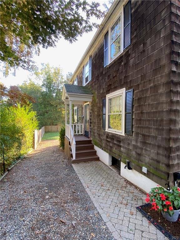 28 Garfield Road West Hartford, CT 06107 - Photo 1 of 1 a front view of a house with a garden