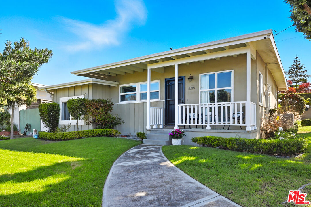 804 Hillcrest Street El Segundo, CA 90245 - Photo 2 of 34 a view of a house with a yard