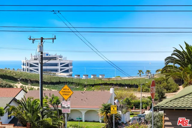 a view of swimming pool with outdoor seating