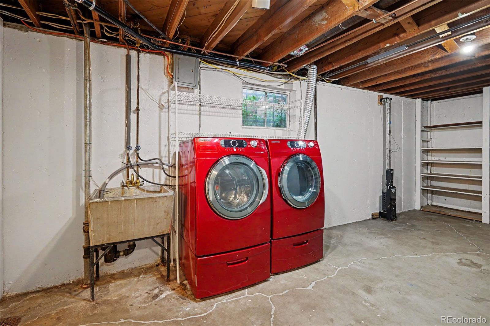 3217 South Stuart Street Denver, CO 80236 - Photo 24 of 29 a utility room with dryer and washer