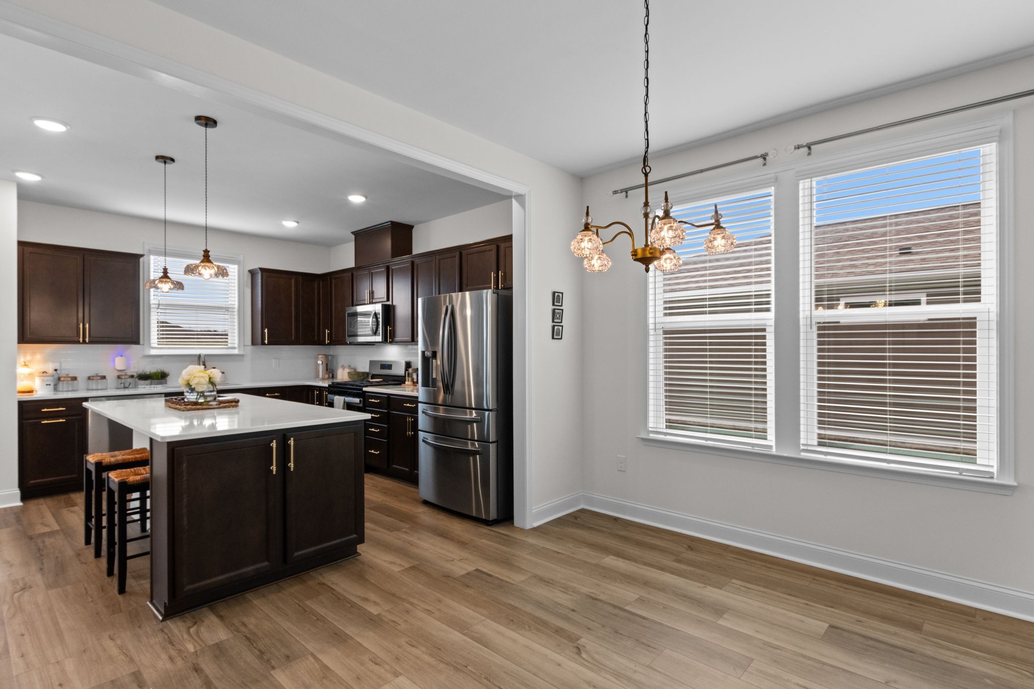 7153 Triad Way Murfreesboro, TN 37128 - Photo 12 of 35 a kitchen with stainless steel appliances granite countertop a stove and a refrigerator