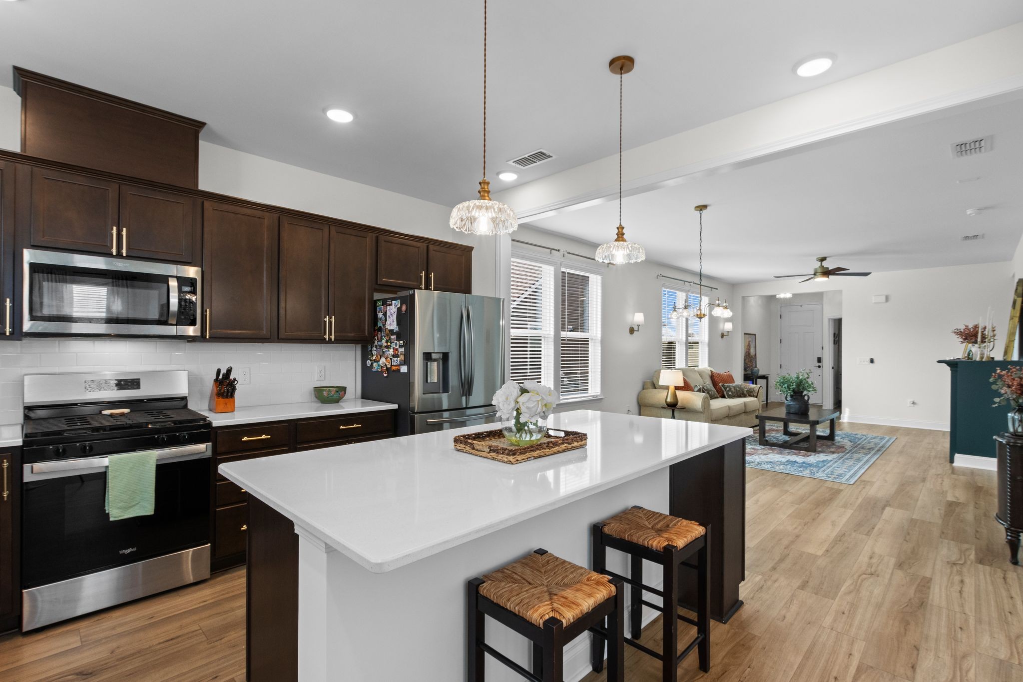 7153 Triad Way Murfreesboro, TN 37128 - Photo 17 of 35 a kitchen with a dining table and chairs