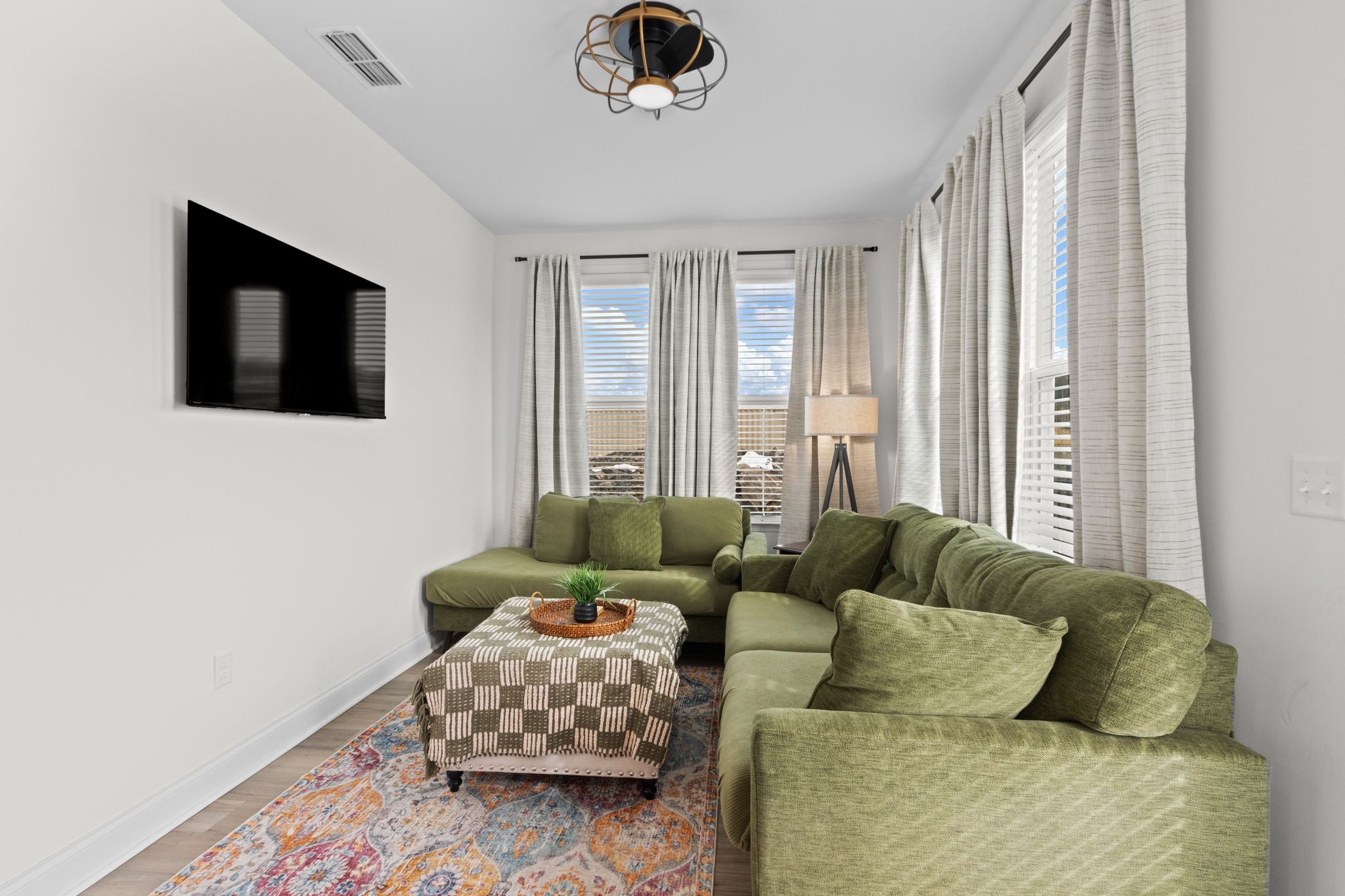 7153 Triad Way Murfreesboro, TN 37128 - Photo 20 of 35 a living room with furniture and a flat screen tv