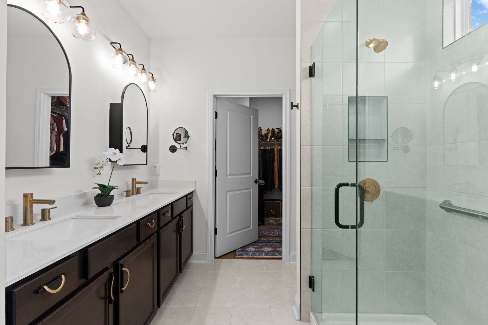 7153 Triad Way Murfreesboro, TN 37128 - Photo 23 of 35 a spacious bathroom with a double vanity sink mirror and shower