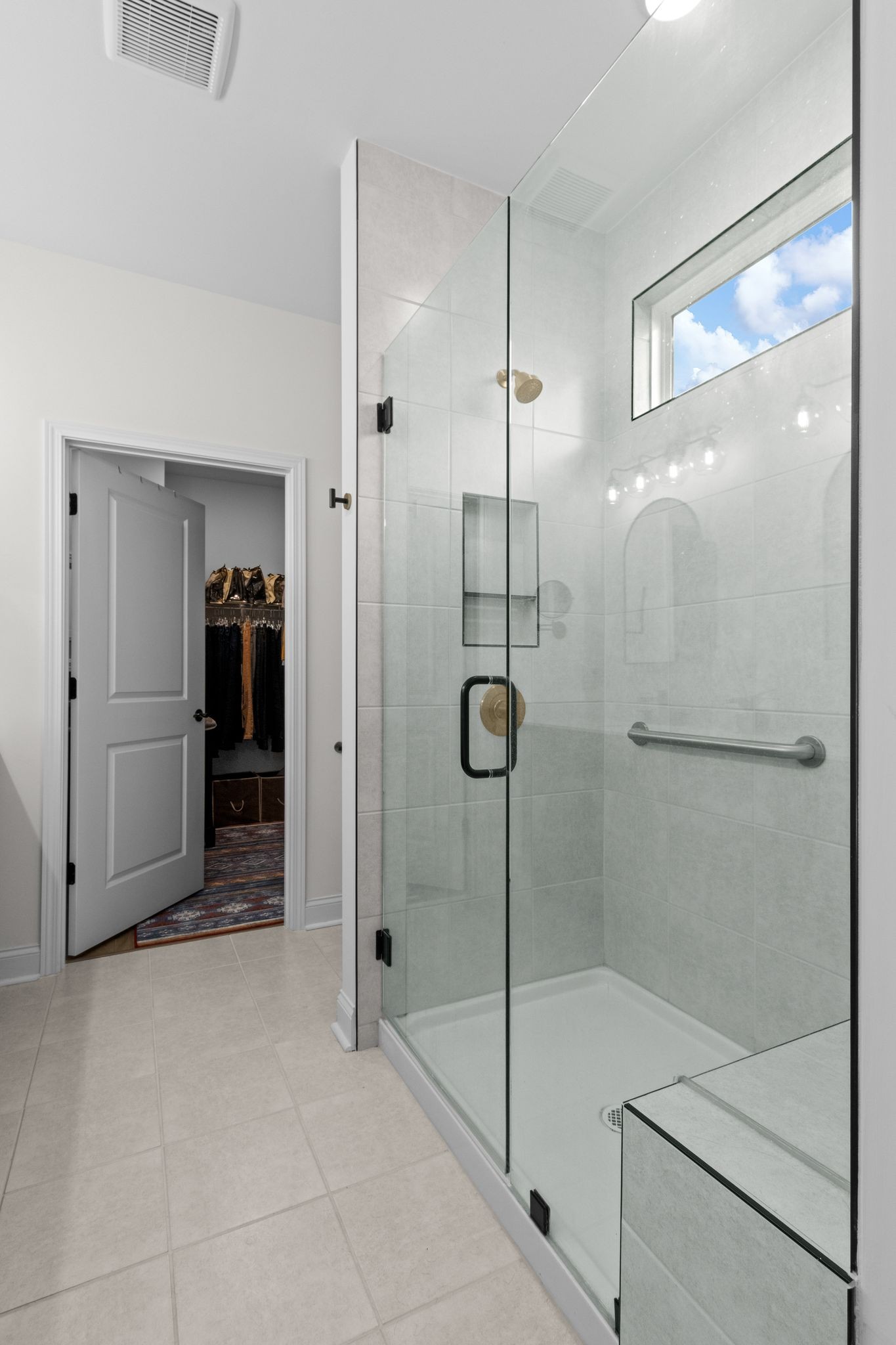 7153 Triad Way Murfreesboro, TN 37128 - Photo 24 of 35 a bathroom with a glass shower door and a sink