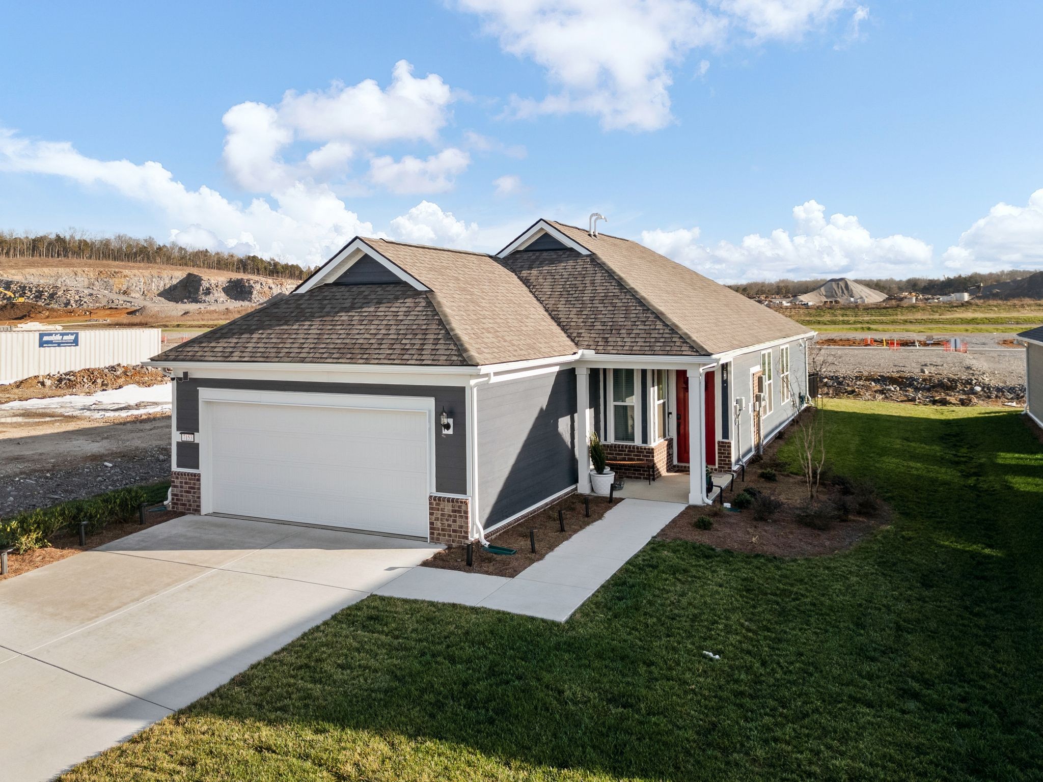 7153 Triad Way Murfreesboro, TN 37128 - Photo 35 of 35 a view of a house with backyard and a garden