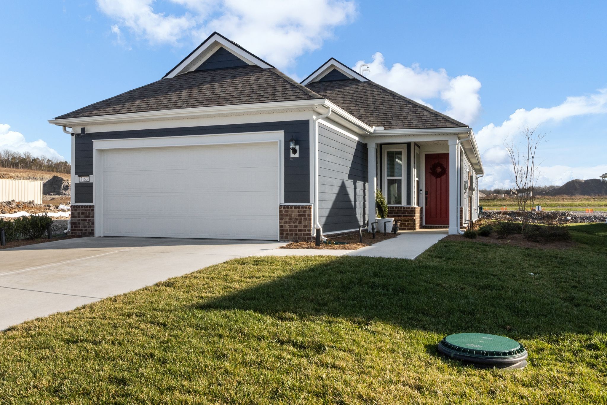 7153 Triad Way Murfreesboro, TN 37128 - Photo 4 of 35 a view of a house with backyard and porch
