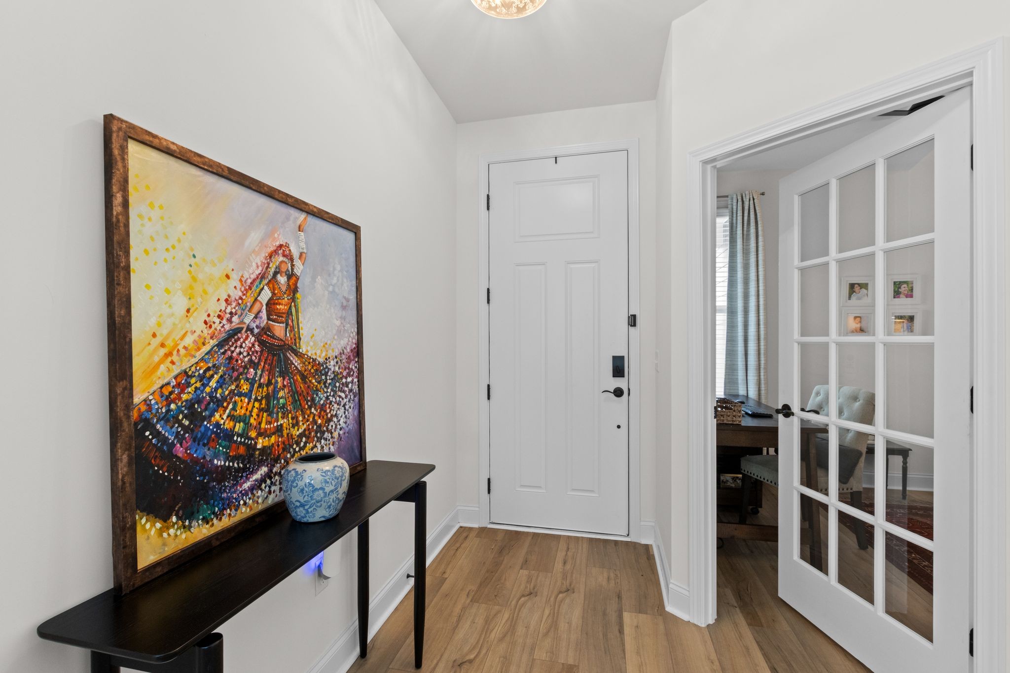 7153 Triad Way Murfreesboro, TN 37128 - Photo 7 of 35 a view of a hallway with wooden floor and closet