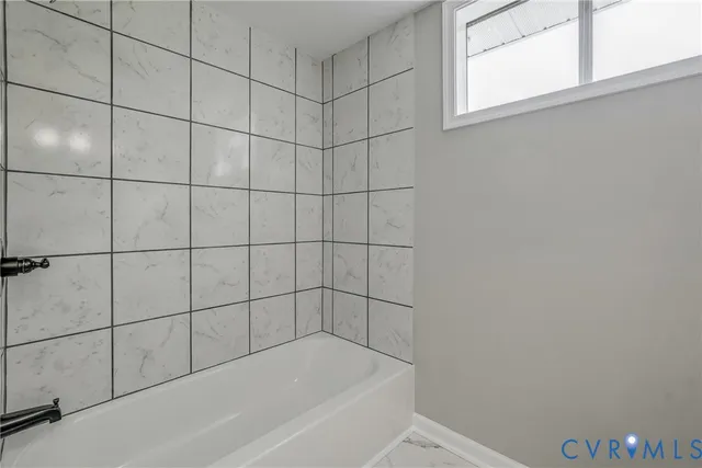 a bathroom with a bathtub